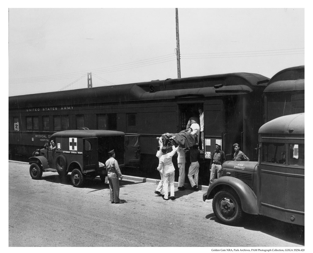 Loading patient out of Army Hospital Train to an awaiting vehicle