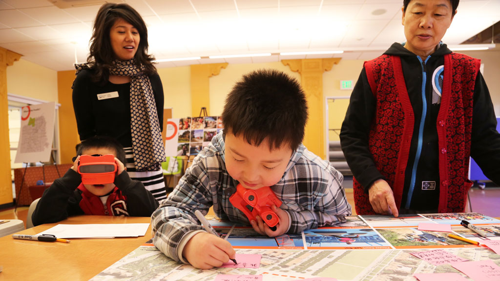 Family with children giving input on Tunnel Tops design