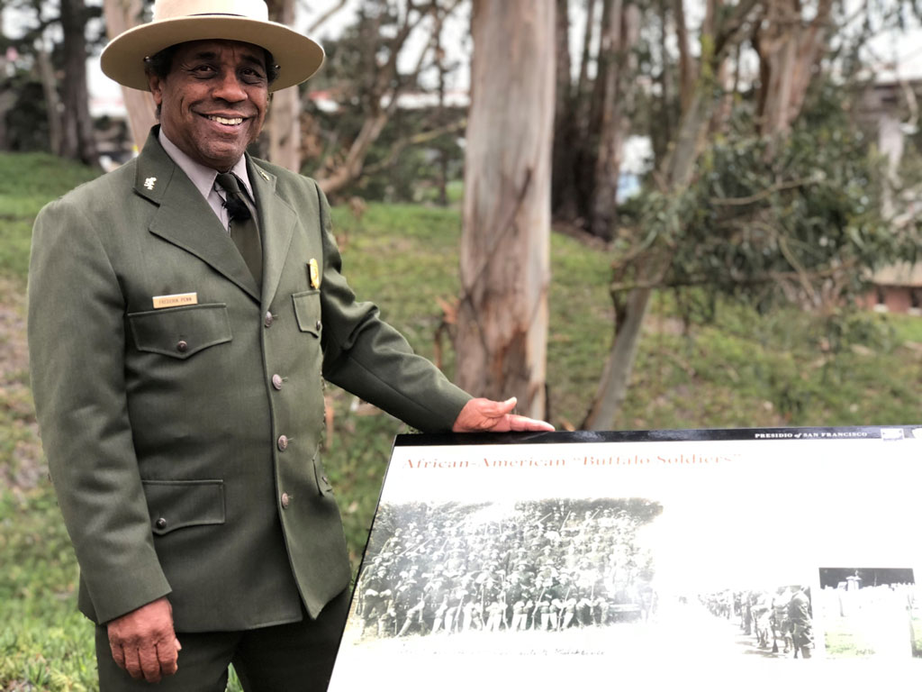 Park Ranger next to Buffalo Soldiers wayside