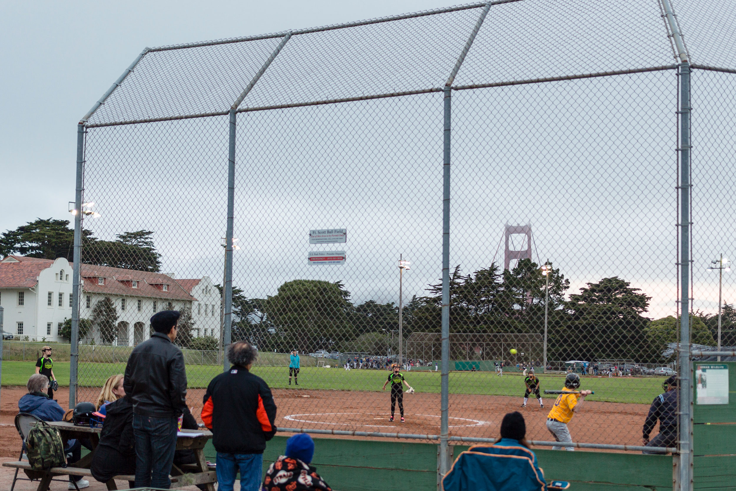 Kids playing baseball at Fort Scott Field.