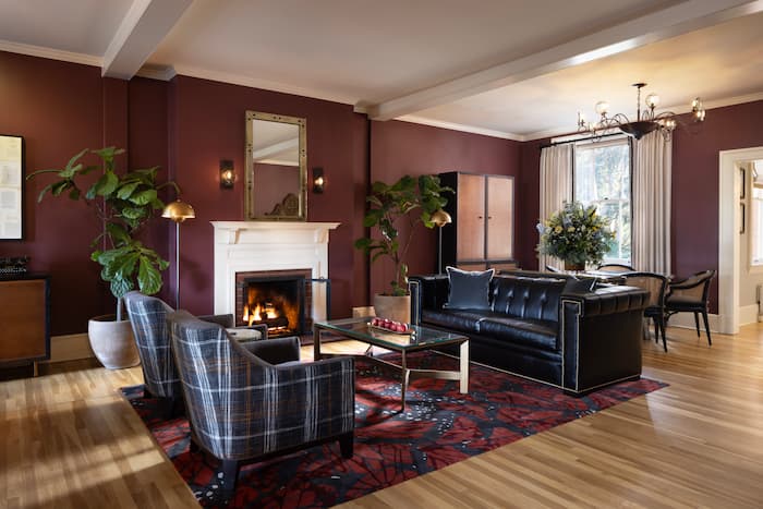 Lobby at the Inn, with couches and fireplace.