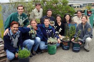 A group of staff and volunteers gather at Presidio Nursery.