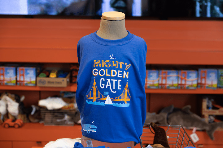 Blue T-shirt on display inside the Golden Gate Bridge Welcome Center.