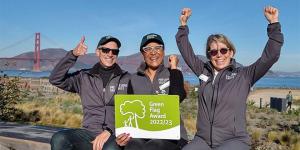 Presidio Trust staff and Green Flag Award 2022/23 in front of Golden Gate Bridge