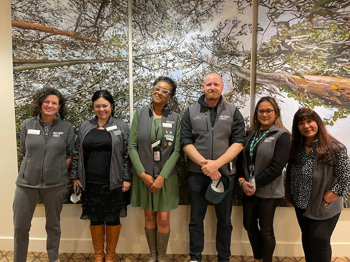 Several Presidio Trust staff members posing for a photo.