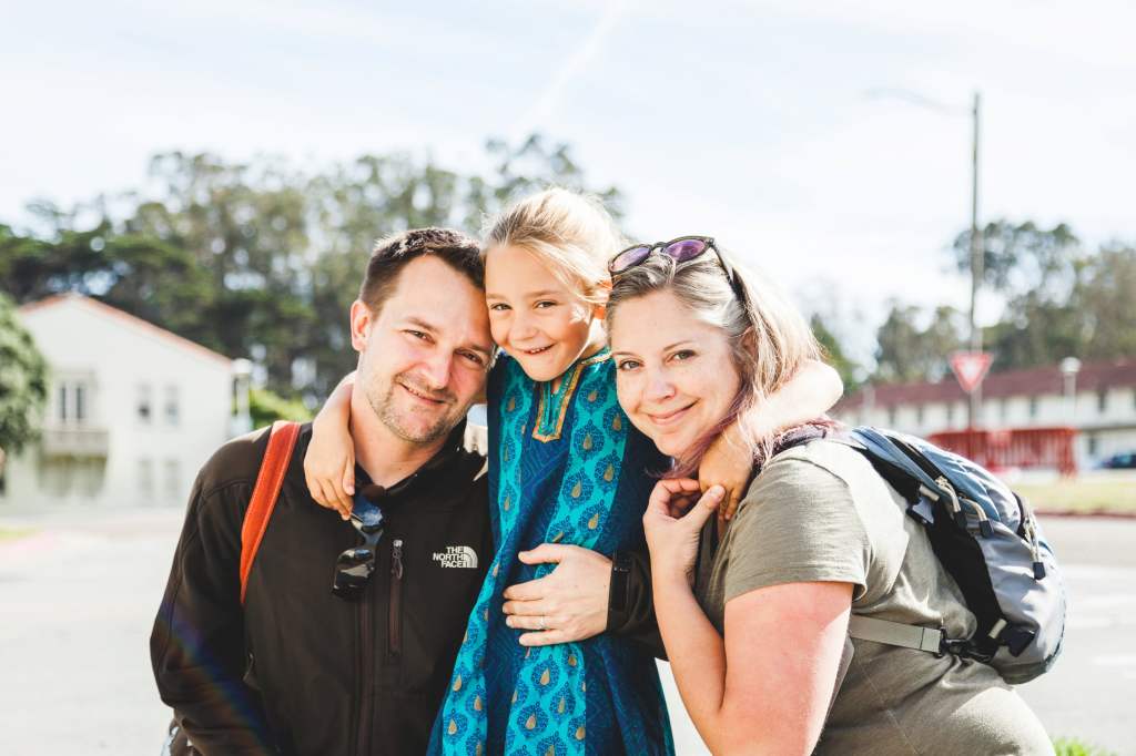 A couple with a child between them.