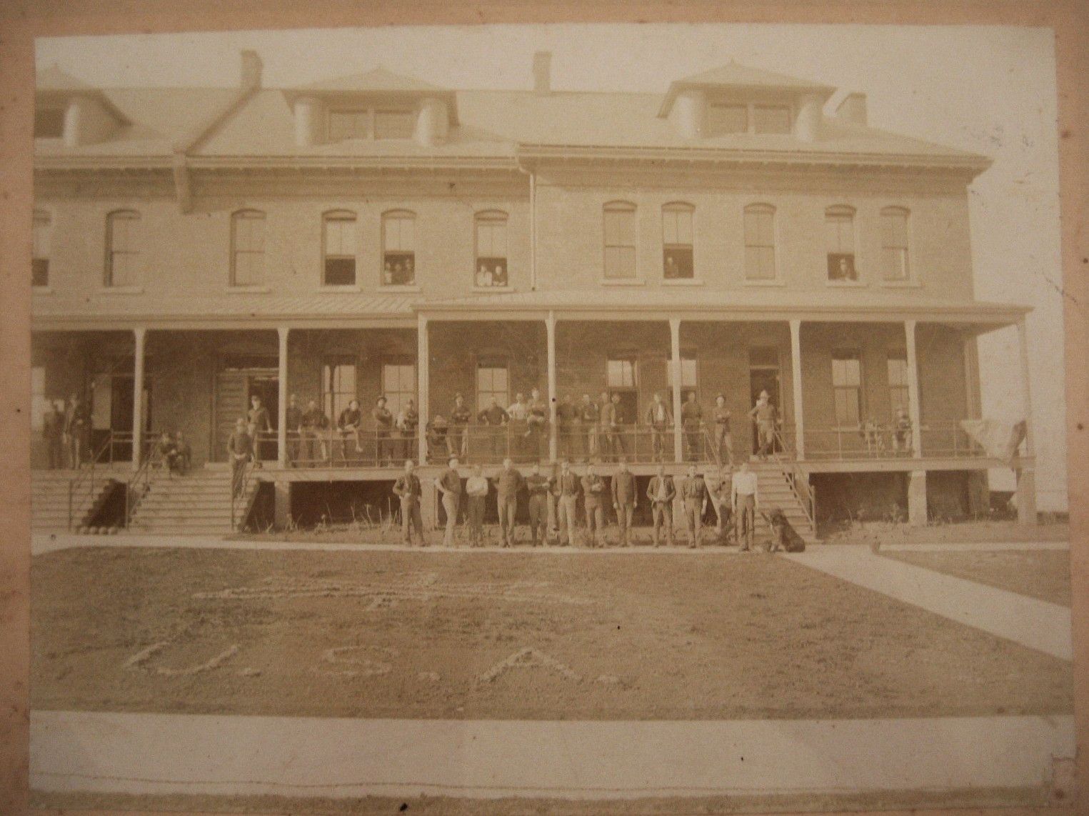 External sepia-tone image of Presidio Lodge